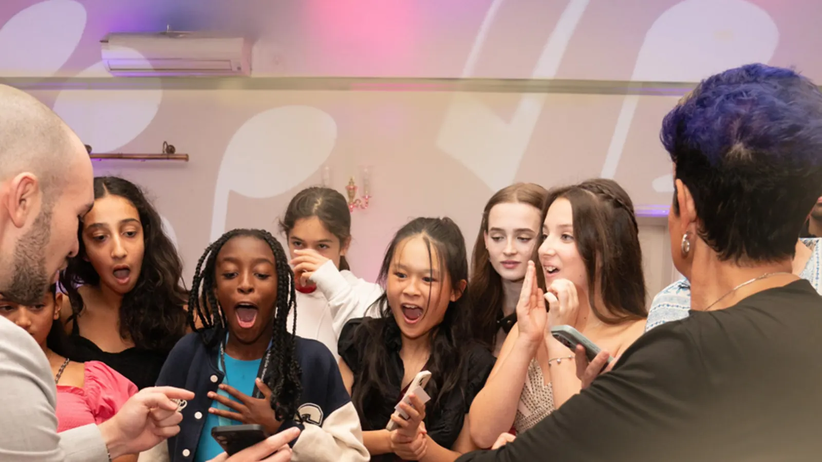 Guests at a Bat Mitzvah reacting to Daniel Bower’s close up magic