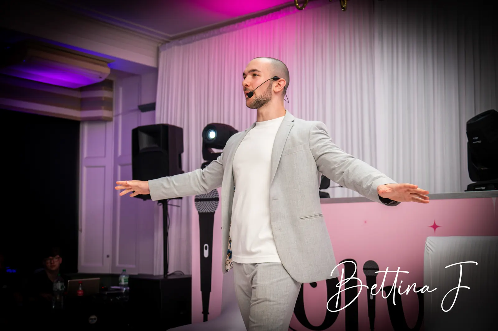 Daniel Bower hosting a simcha on stage