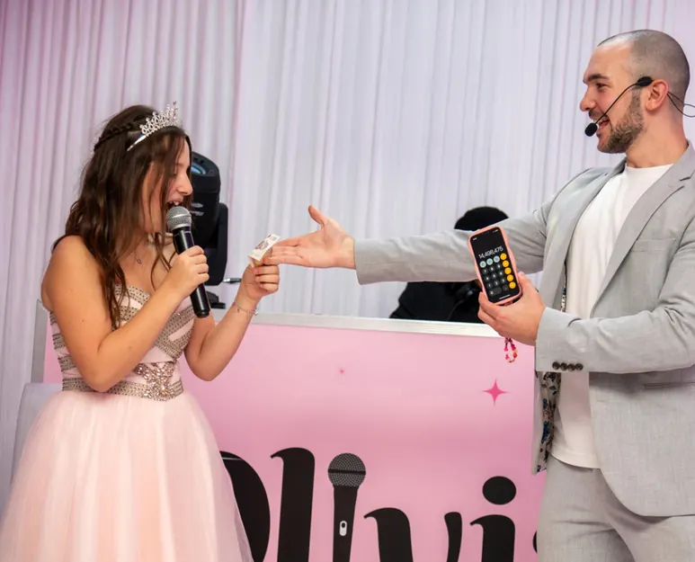 Daniel Bower on stage with the Bat Mitzvah girl during the stage show