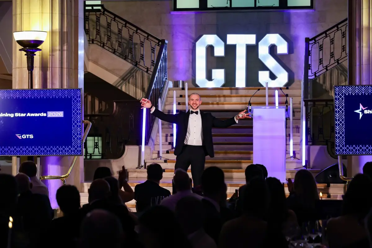 Daniel Bower performing close-up magic for guests at an event